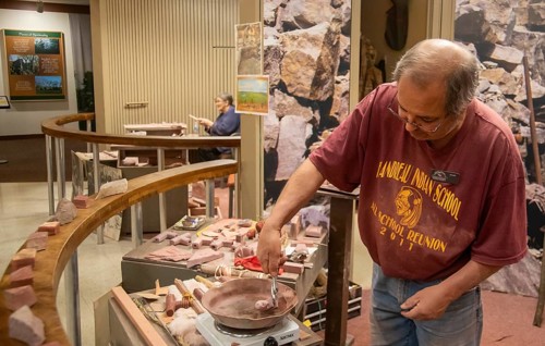 Pipestone, Minnesota, Native Americans make pipes from pipestone at Pipestone National Monument.