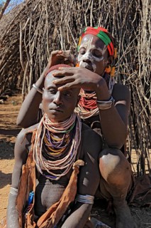 South Ethiopia, Omo region, among the Karo people, woman with jewellery and face painting styling