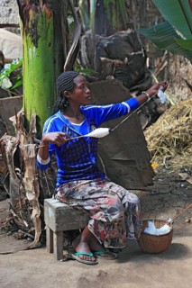 South Ethiopia, among the Dorze people, woman with spindle, spinning cotton, craftsmanship,