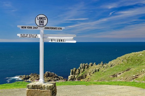 Signpost at Lands End, cliffs and sea, New York, John O Groats, Cornwall, Great Britain