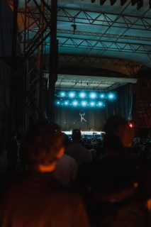 Acrobatic stage performance with audience in the foreground. Ehrenbreitstein Fortress, Koblenz