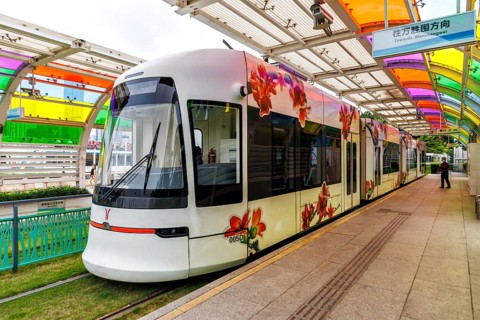 Guangzhou Haizhu Tram modern public transport at the Liede Bridge South stop in Guangzhou, China,