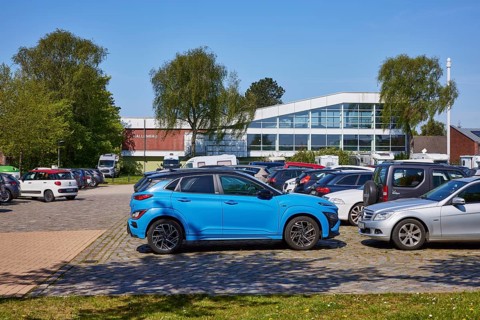 Indoor swimming pool with car park in Niebuell, Nordfriesland district, Schleswig-Holstein,