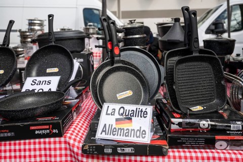 Pans and pots, La Qualite Allemande sign, Made in Germany, market, Montparnasse, Paris, France,