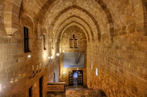 Interior view of a historic building with vaulted ceiling and soft lighting, interior view, Grand