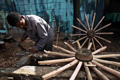 Wheelwright at work, Antsirabe, Madagascar, Africa
