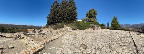 View of upper part of settlement of Phaistos with upper square courtyard open space court left next