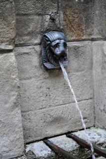 Bilbao, Basque Country, Spain, Europe, Close-up of a lion's head gargoyle in operation on a stone