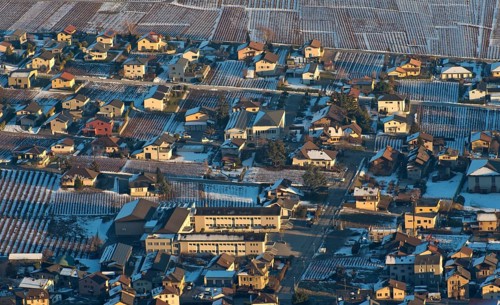 View from above of a settlement structure with loose, open development of detached residential