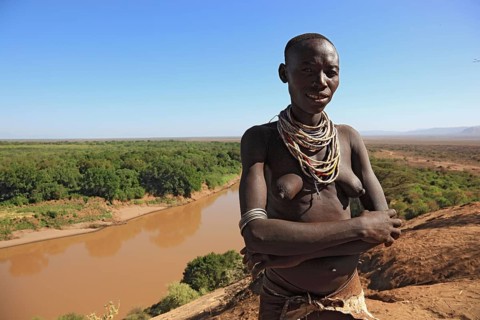 South Ethiopia, Omo region, Omo river landscape, proud woman of the Karo people with necklace,