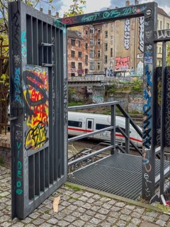 Germany, Berlin, 26.04.2024, S-Bahn ring railway trench, open service gate, ICE, view to