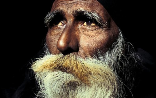 Portrait of a fakir, muslim ascetic near the Moinuddin Chishti mausoleum, Dargah sharif at Ajmer,
