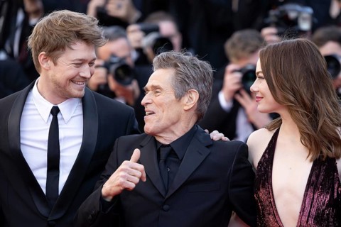 Cannes, France, 17.5.2024: Joe Alwynbei, Willem Dafoe and Emma Stone at the premiere of Kinds of