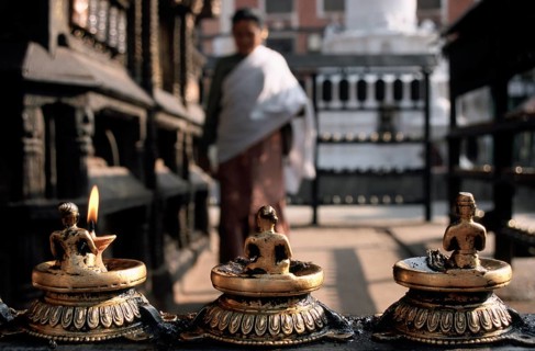 Newari woman walking around a Newari temple, Harati temple, Kathmandu valley, Nepal. Newar are the