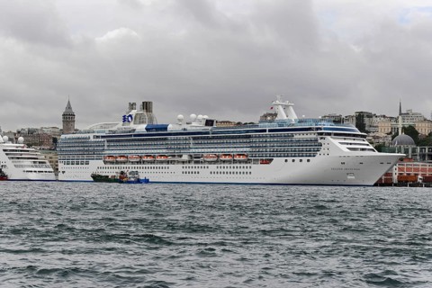 Cruise ship ISLAND PRINCESS, A white cruise ship against the historic backdrop of the Galata Tower