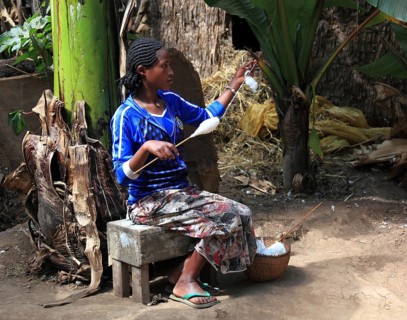 South Ethiopia, among the Dorze people, woman with spindle, spinning cotton, craftsmanship,