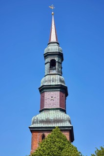 Spire of St Laurentius Church in Toenning, North Friesland district, Schleswig-Holstein, Germany,