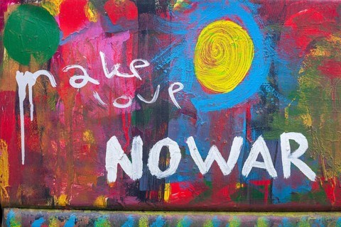 Lettering make Love No War, no war, colourfully painted vintage car, colour surface, Germany,