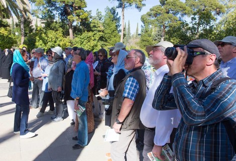 Tourists visit a tropical garden in Shiraz, Shiras, Iran on 03/04/2015