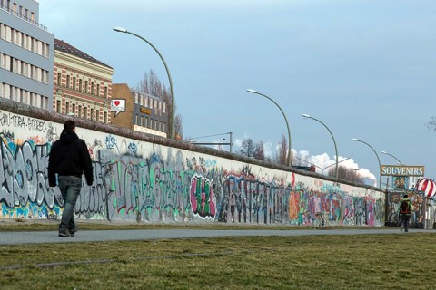 A man walks along the remains of the Berlin Wall, the East Side Gallery, 20/02/2014
