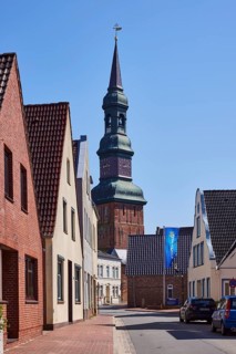 Houses and St Laurentius Church in Toenning, North Friesland district, Schleswig-Holstein, Germany,