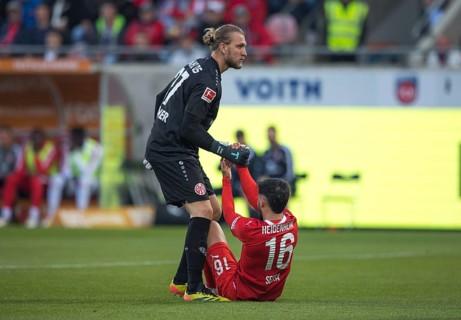 Football match, The exhausted Kevin SESSA 1. FC Heidenheim right, still sitting on the pitch, is
