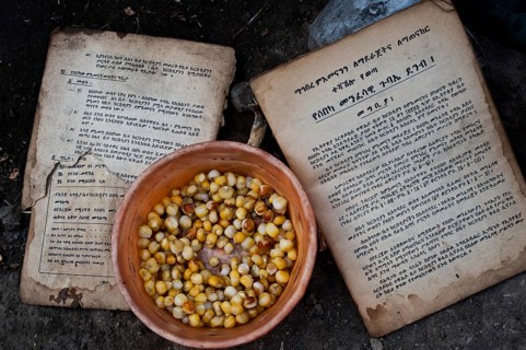 Orthodox christian books written in geez language, maize dish, food eaten by a family in Tigray