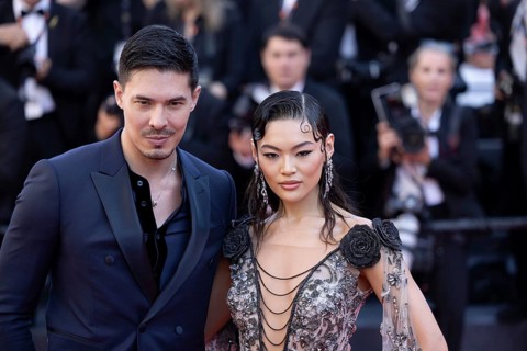 Cannes, France, 17.5.2024: Lewis Tan and Lucy Qiu at the premiere of Kinds of Kindness on the red