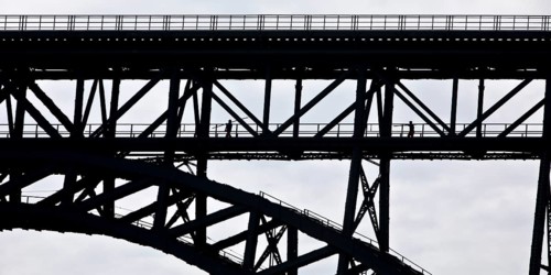Muengsten Bridge with railway workers, highest railway bridge in Germany between Solingen and
