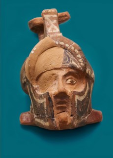 Vase in the shape of a helmeted head, motif cropped, background AI generated, old mask in the shape