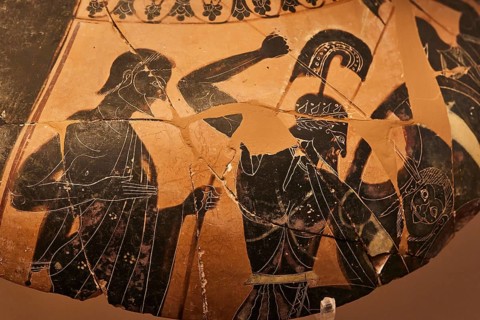 Detail, Greek antique vase with a black and orange scene depicting mythological figures, Heracles,