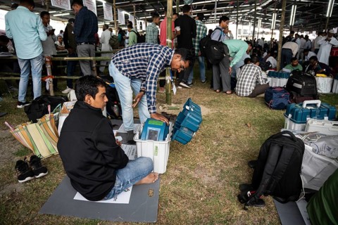 Barpeta, India. 6 May 2024. Polling officials collects Electronic Voting Machines (EVMs) and Voter