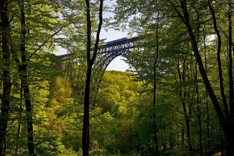 View from the forest to the Muengsten Bridge with railway, the highest railway bridge in Germany
