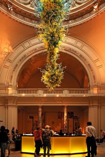 Artistic glass object in the reception hall with information stand of the Victoria & Albert Museum,