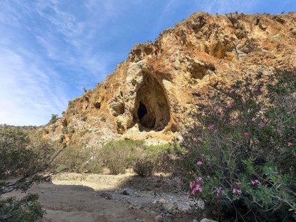 View of large natural grotto cave A Muerte in Agiofarago gorge of the saints on south coast of