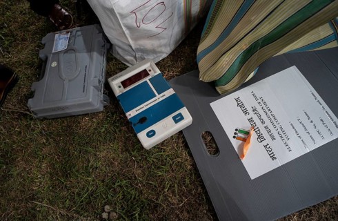 Barpeta, India. 6 May 2024. Polling officials collects Electronic Voting Machines (EVMs) and Voter