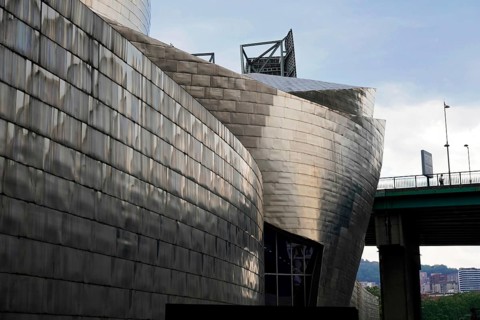 Guggenheim Museum Bilbao, Spain, Europe, Exterior view of a modern brushed steel building in an