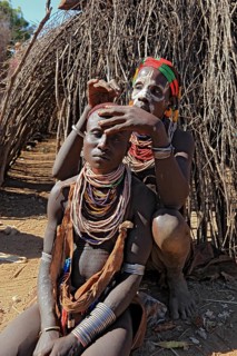 South Ethiopia, Omo region, among the Karo people, woman with jewellery and face painting styling