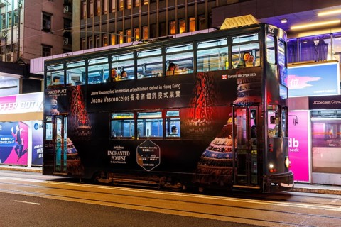 Hong Kong Tramway double-decker public transport at the Pedder Street stop in Hong Kong, China,