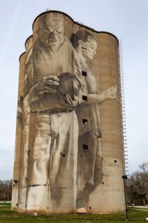Fort Dodge, Iowa, A mural on the disused Fort Dodge Grain Terminal shows seven figures representing