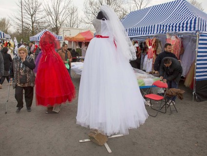 A Turkish stall offers wedding dresses at the flea market in Gelsenkirchen, on 12/04/2015,