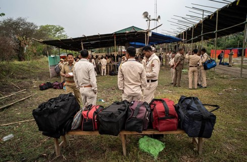 Barpeta, India. 6 May 2024. Police personnels arrives with luggage to leave for allocated polling
