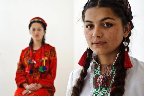 Teenage girl and woman from the nizari ismaili community, traditionally dressed muslim women,
