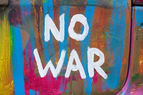 Lettering No War, kein Krieg, colourfully painted vintage car, colour surface, Germany, Europe