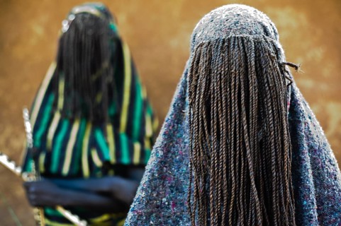 Teenage boys following their initiation rite, portrait of teens from the Pokot tribe, Kenya. Once