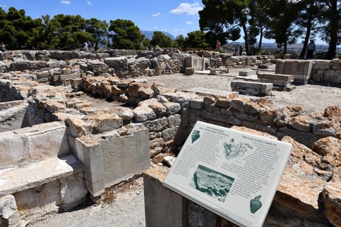 View of east wing complex on hill with foundation walls Ground find of palace of Phaistos