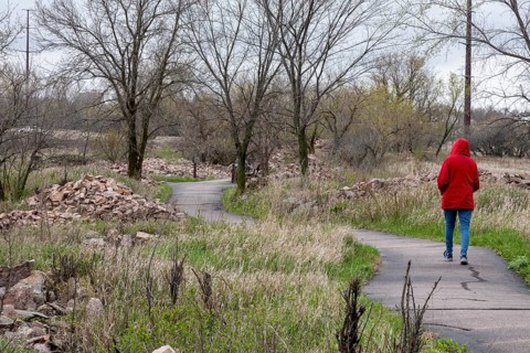 Pipestone, Minnesota, A tourist walks along a path by active quarries at Pipestone National