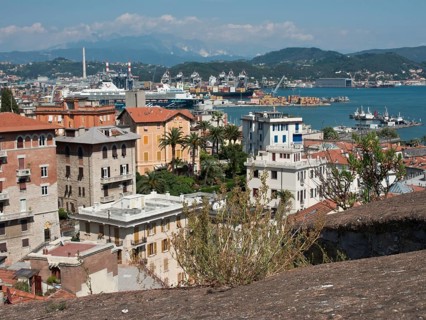 View of the urban skyline of a harbour city with buildings and the sea, Bari, Italy, Europe
