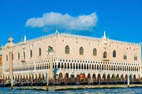 Ducal Palace on Saint Mark Square and Grand Canal with Many Gondola in a Sunny Day in Venice,