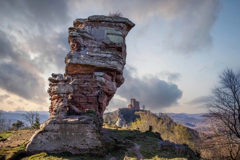 View of Trifels Castle, from Engels Landing rock, with the young tower in autumn at sunset.